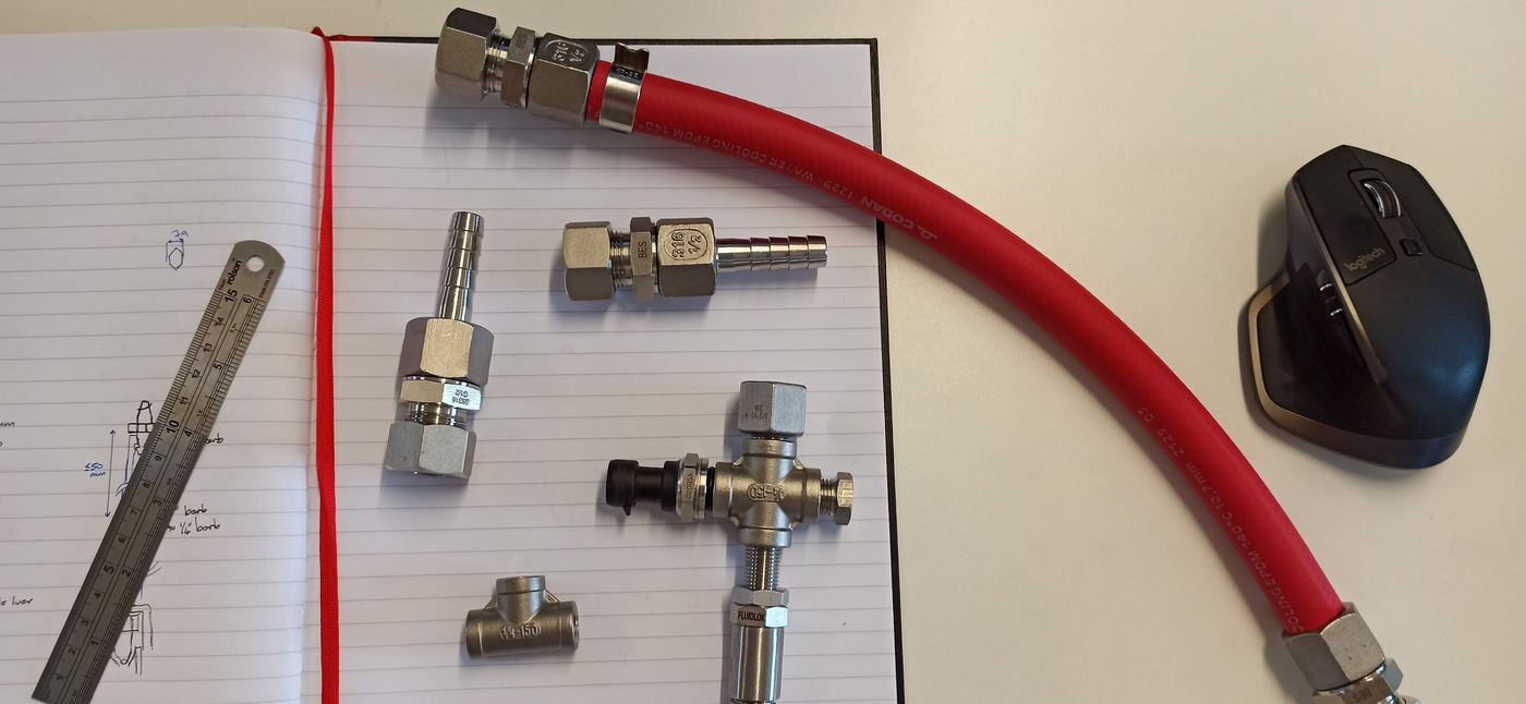 Fittings and hose for a fluidics subsystem